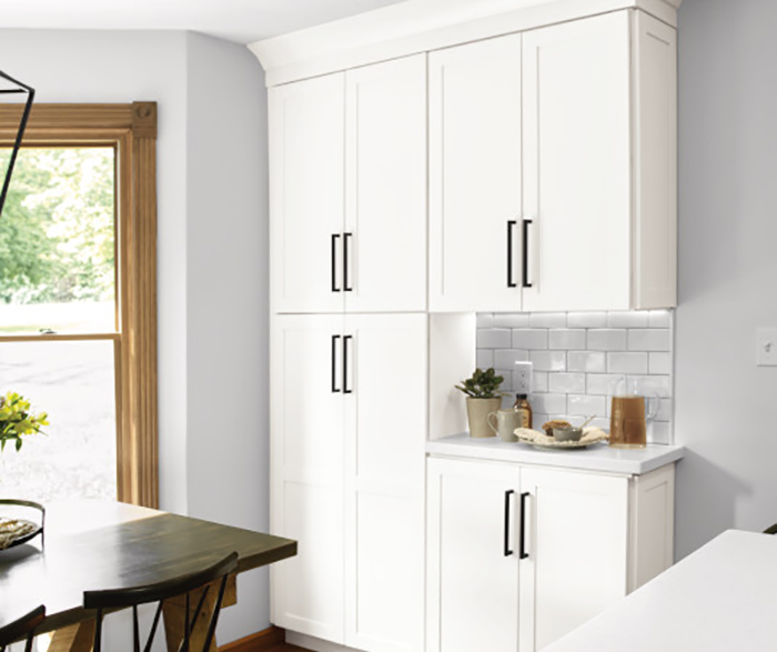 Shaker Style Cabinets Shine in Two Tone Kitchen